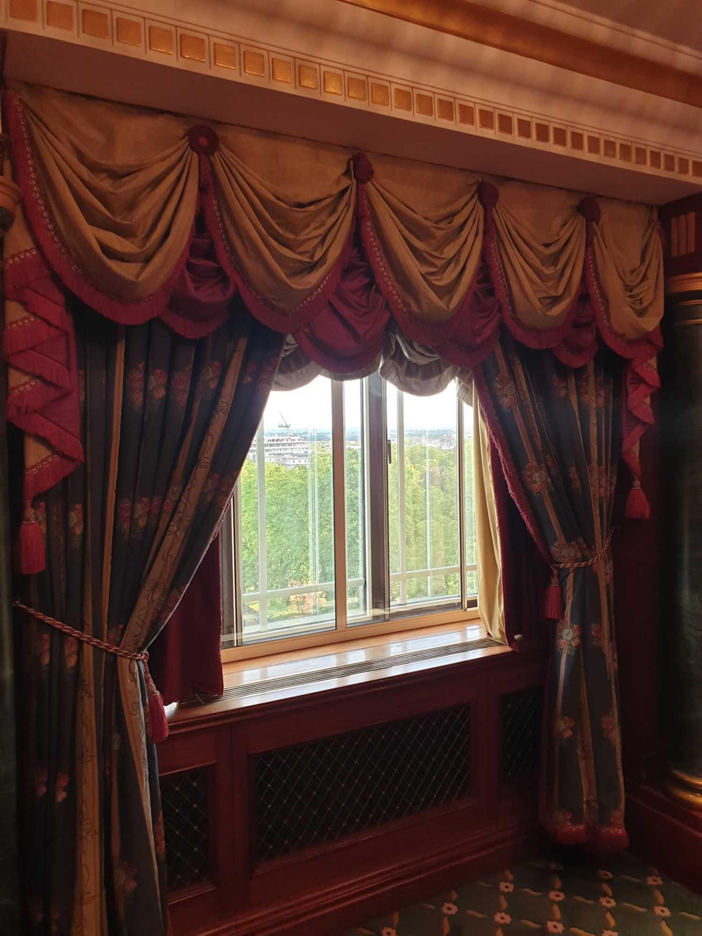 A Pair Of Silk Drapes Jabots And Swags Green And Gold Floral Curtains With A Red Frill Trim And