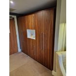 Wardrobe amenity cabinet designed by Grass the cabinet with integral wardrobe space internally