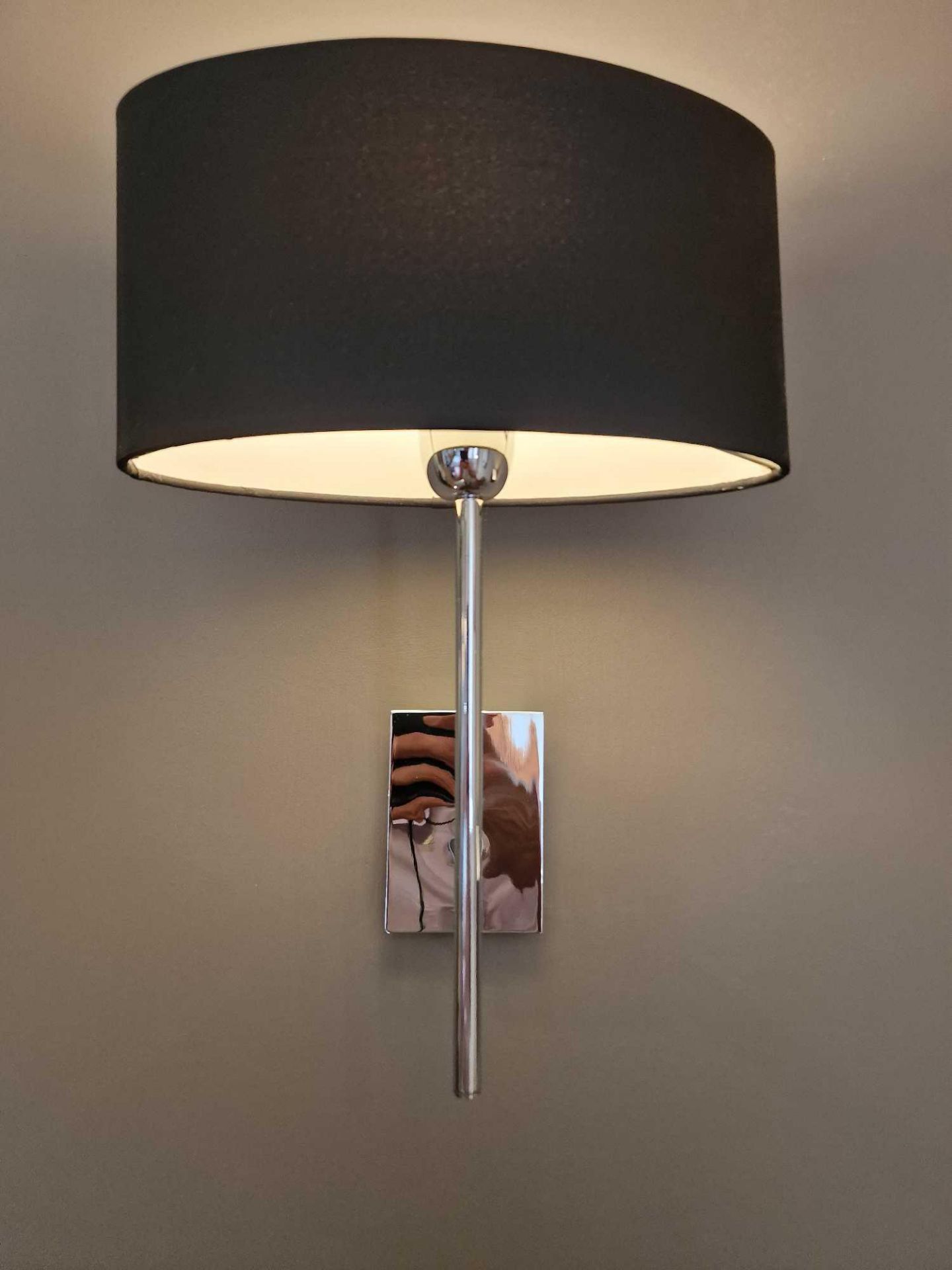 A pair of wall sconces with shades ( Location : 303)
