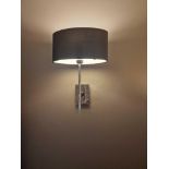 A pair of wall sconces with shades ( Location : 204)