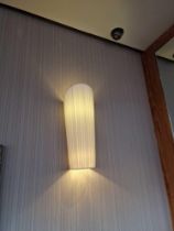 A pair of pleated shade wall wash up and down light sconces 60cm tall ( Location: Browns)