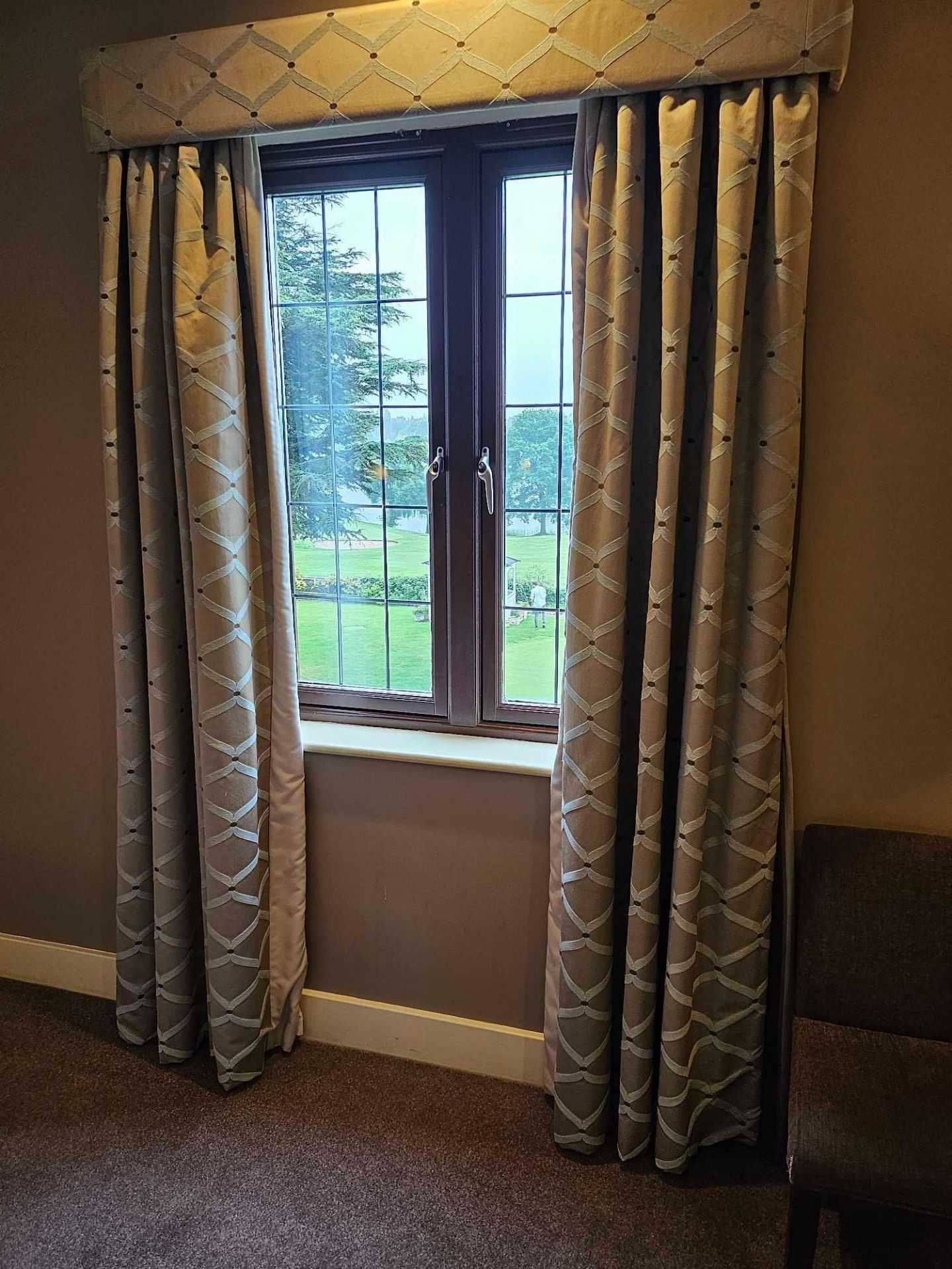 A pair of drapes with pelmet fully lined thermal black out pinch pleat top spans 115 x 215cm (