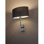 A pair of wall sconces with shades ( Location : 223)