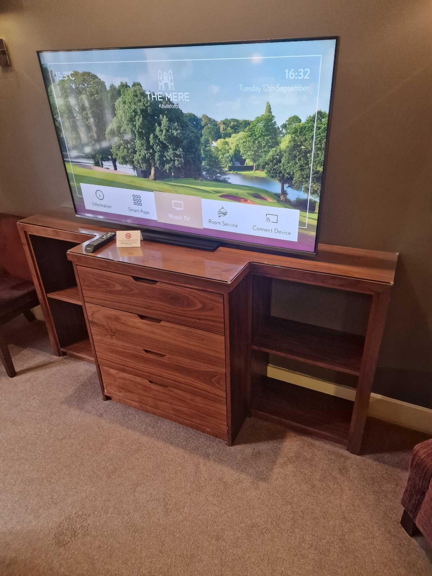 A breakfront cherrywood oak finish four drawer console dresser with glass protective top 190 x 50