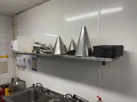 Wall mounted stainless steel shelf ( Location: Main Kitchen )