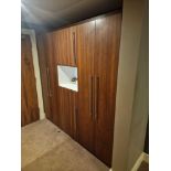 Wardrobe amenity cabinet designed by Grass the cabinet with integral wardrobe space internally