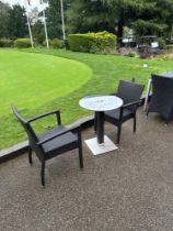 Varaschin Outdoor Round Rattan Table And Two Armchairs. Table Has A Metal Base Rotten Stem And