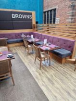 Banquette seating U shaped format in a mauve and grey upholstered suede effect fabric seats
