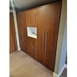 Wardrobe amenity cabinet designed by Grass the cabinet with integral wardrobe space internally