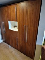 Wardrobe amenity cabinet designed by Grass the cabinet with integral wardrobe space internally