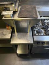 Stainless steel preparation table with undershelf and over shelf ( Location: Upstairs Kitchen)