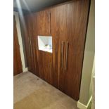 Wardrobe amenity cabinet designed by Grass the cabinet with integral wardrobe space internally