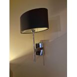 A pair of wall sconces with shades ( Location : 106)
