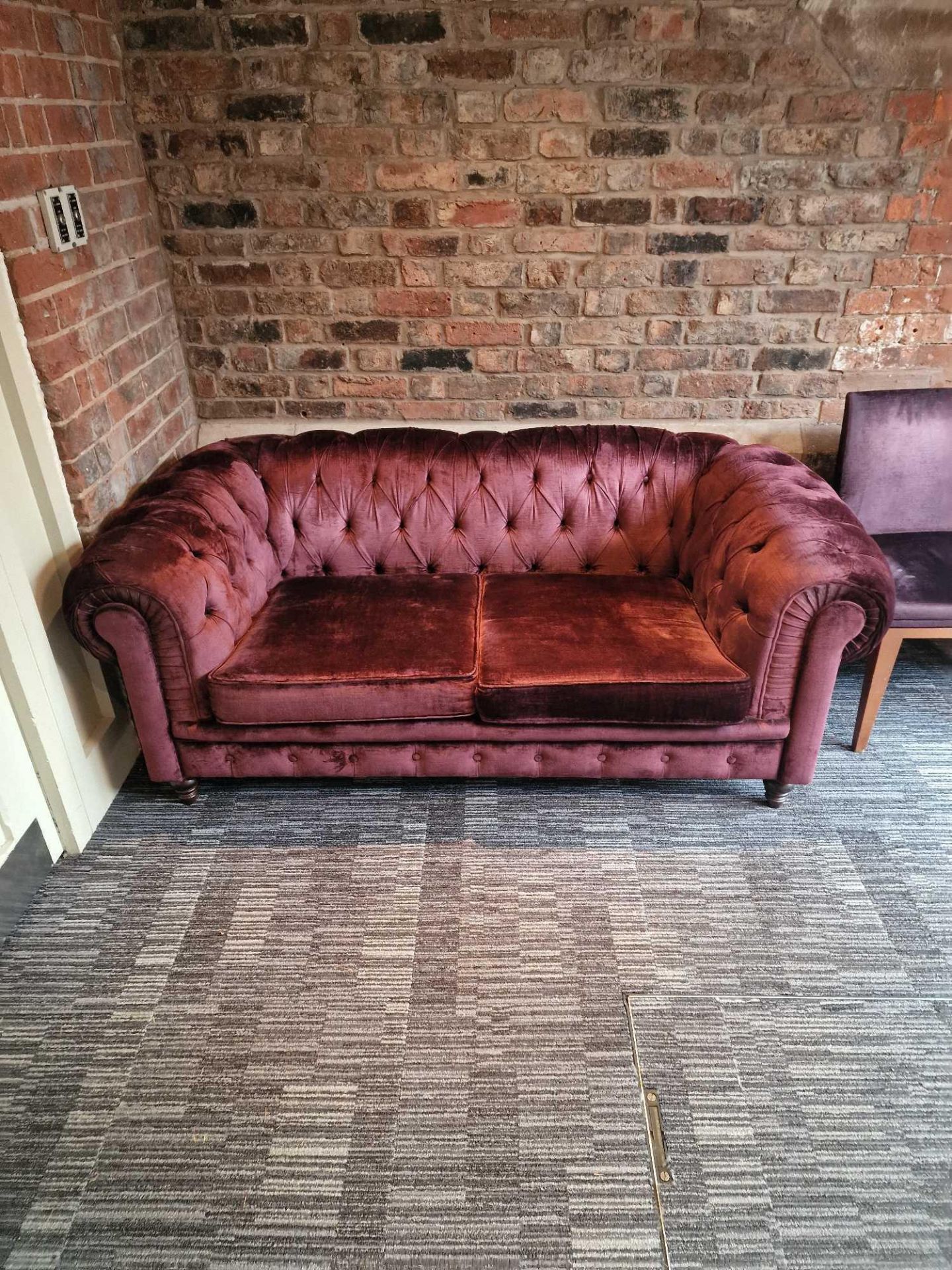 A pair of Chesterfield style fabric sofas with classic rolled arms and tufted profile upholstered in - Image 4 of 4