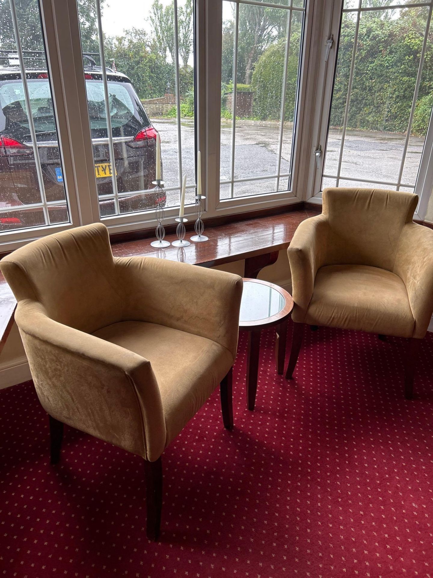 Pair Of Gold Fabric Occasional Chairs With A Glazed Wooden Occasional Table.