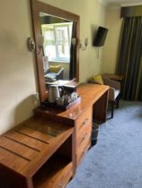 Contents of guest bedroom number 27 at the Brookfield Hotel. Darkwood bedroom desk with 3 drawers