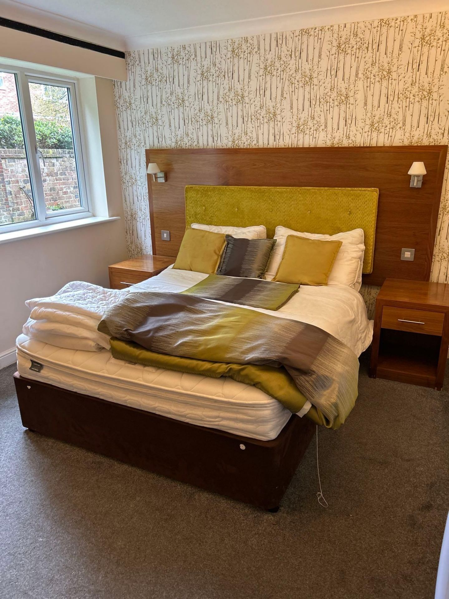 Contents of guest bedroom number 26 at the Brookfield Hotel. Darkwood bedroom desk with 3 drawers