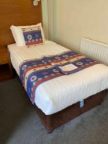 Contents of guest bedroom number 28 at the Brookfield Hotel. Darkwood bedroom desk with 3 drawers