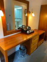 Contents of guest bedroom number 24 at the Brookfield Hotel. Darkwood bedroom desk with 3 drawers