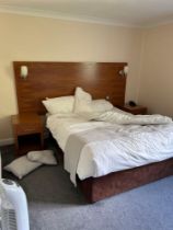 Contents of guest bedroom number 38 at the Brookfield Hotel. Darkwood bedroom desk with 3 drawers