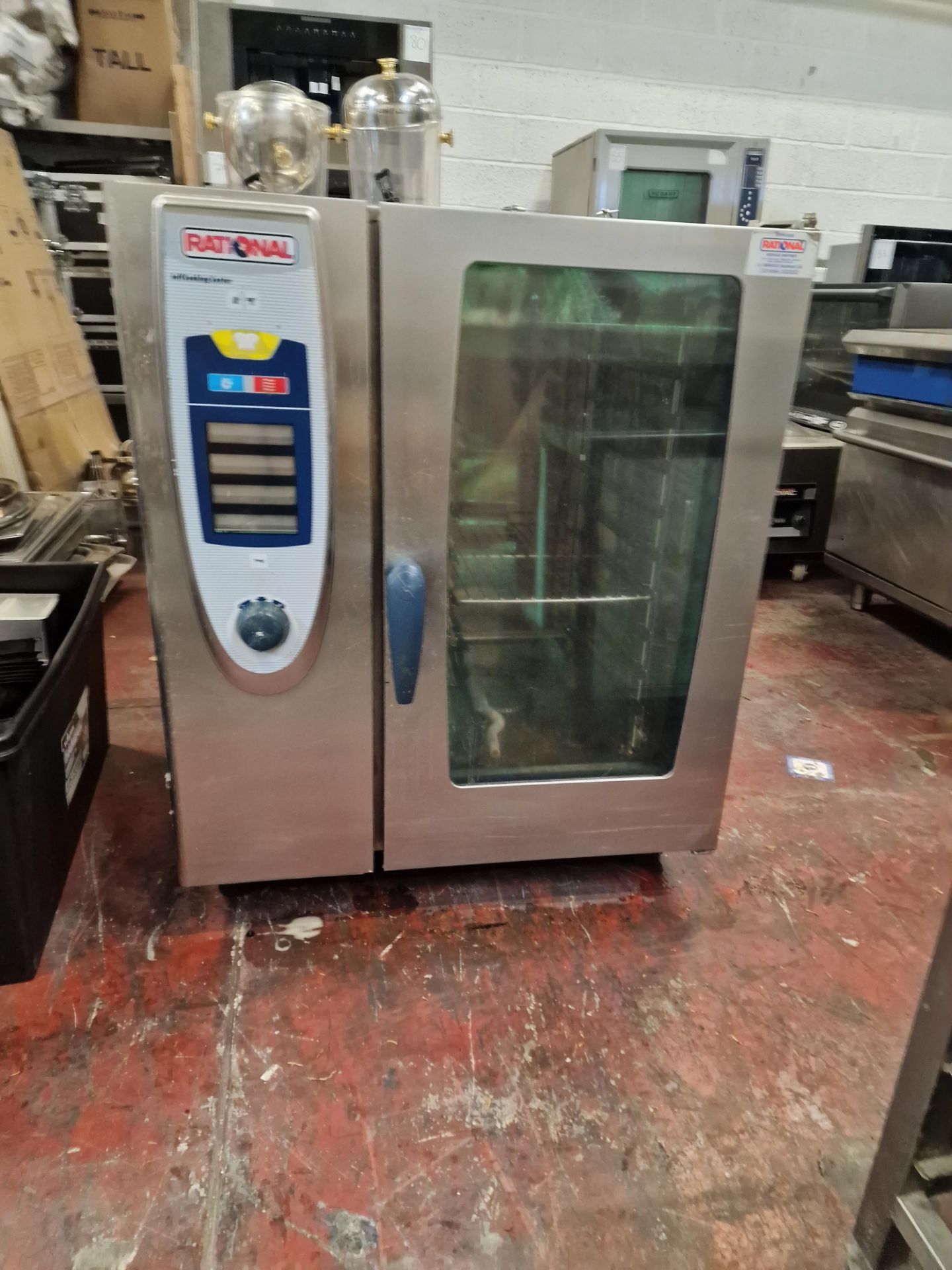Single Stack Oven Rational Rational Selfcooking center 10 grid combi oven on stainless steel stand ...