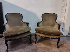 A Pair Of Louis XV Style Bergere The Slightly Flared Arms Have Upholstered Armrests Upholstered In