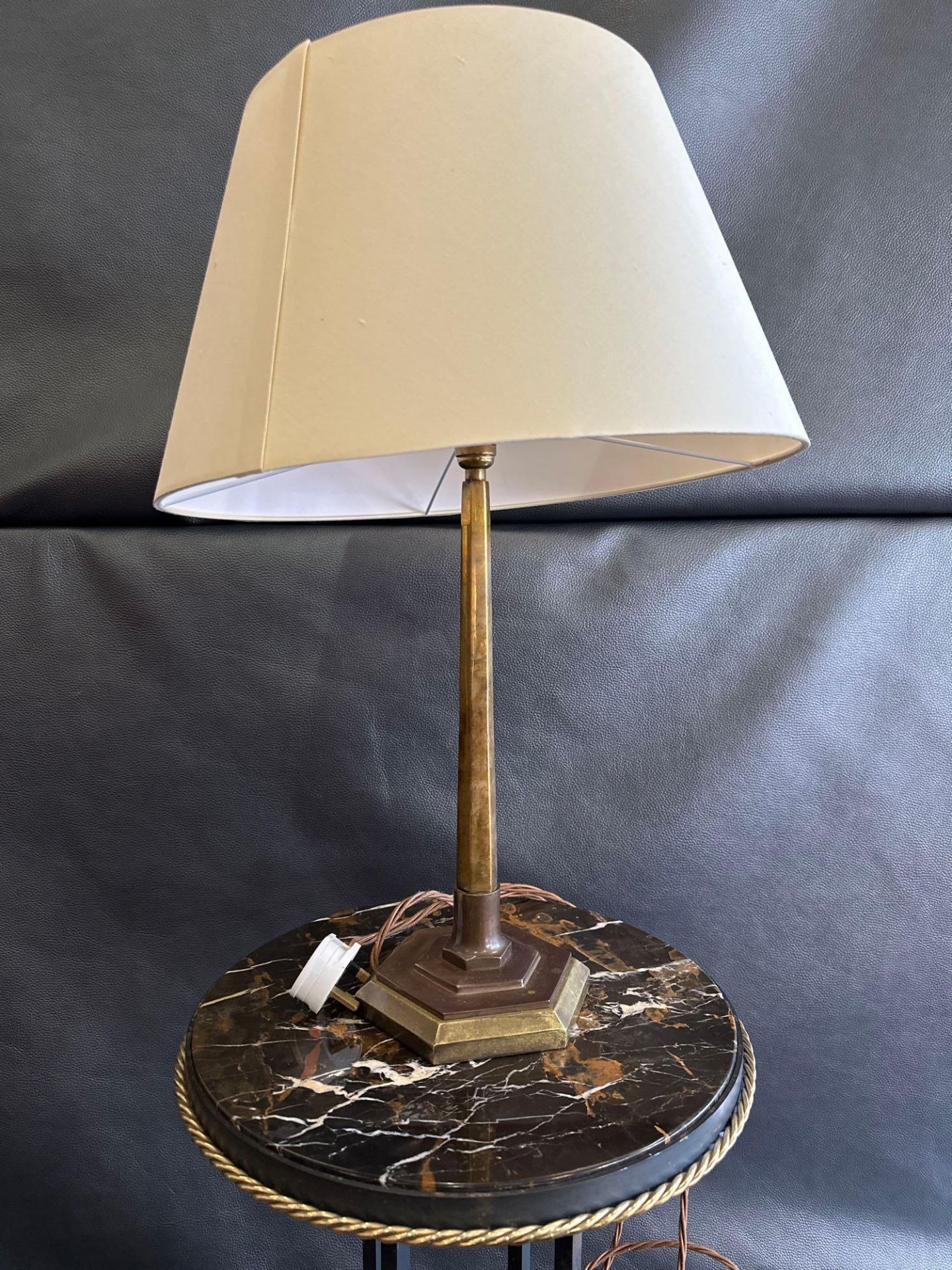 A Antiqued Brass Table Lamp With Shade On Octagonal Shaped Base 60cm