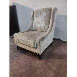 A Champagne Luxury Upholstered Relaxer Chair Sloping Arms With Overstuffed Sprung Back Rest And Seat