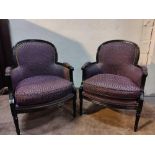 A Pair Of French Louis Style Bergere Chairs Black Wood Frame Upholstered In A Mauve Contract