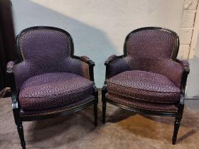 A Pair Of French Louis Style Bergere Chairs Black Wood Frame Upholstered In A Mauve Contract