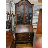 A Mahogany 3 Drawer Bureau Library Case The Domed Glazed Top Above A Sloping Drop Down Central