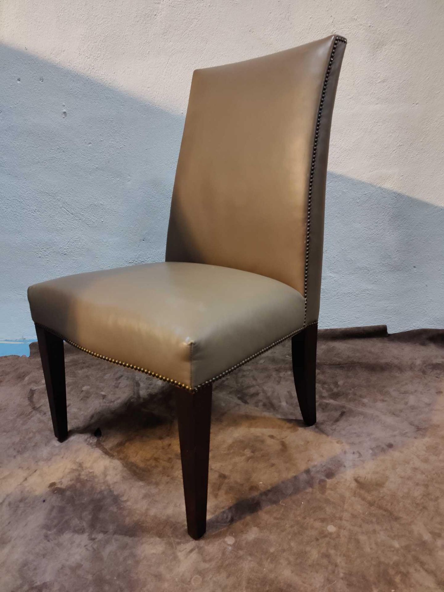 A Pair Of Leather Tall Back Side Chairs With Pin Detail Trimming 60 x 55 x 101cm