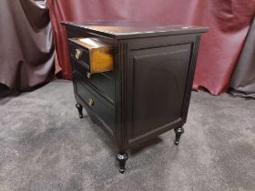 A Pair Four Drawer Nightstand Commode Chests Raised By Four Block Feet With A Square Carved Motif