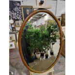 A Ovoid Wooden Decorative Framed Bevelled Mirror 65 x 95cm