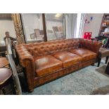 A Chesterfield Style Three Seater Sofa Upholstered In Heritage Tan Leather The Chesterfield