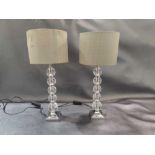 A Pair Of Modern Stacked Balls Design Table Lamps In A Silver Polished Chrome Metal Finish With A