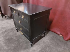 A Pair Four Drawer Nightstand Commode Chests Raised By Four Block Feet With A Square Carved Motif