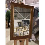 A Gold Framed Accent Mirror With A Ridged Decorative Surround 60 x 90cm