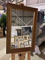 A Gold Framed Accent Mirror With A Ridged Decorative Surround 60 x 90cm