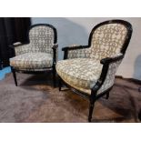 A Pair Of Bergere Chairs Black Wood Frame Upholstered In A Gold Cream Pattern With Stud Pin Detail