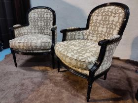 A Pair Of Bergere Chairs Black Wood Frame Upholstered In A Gold Cream Pattern With Stud Pin Detail
