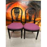 An Ebonised Lacquered Pair Of Georgian Style Side Chairs With Carved Vasiform Splat Backs And