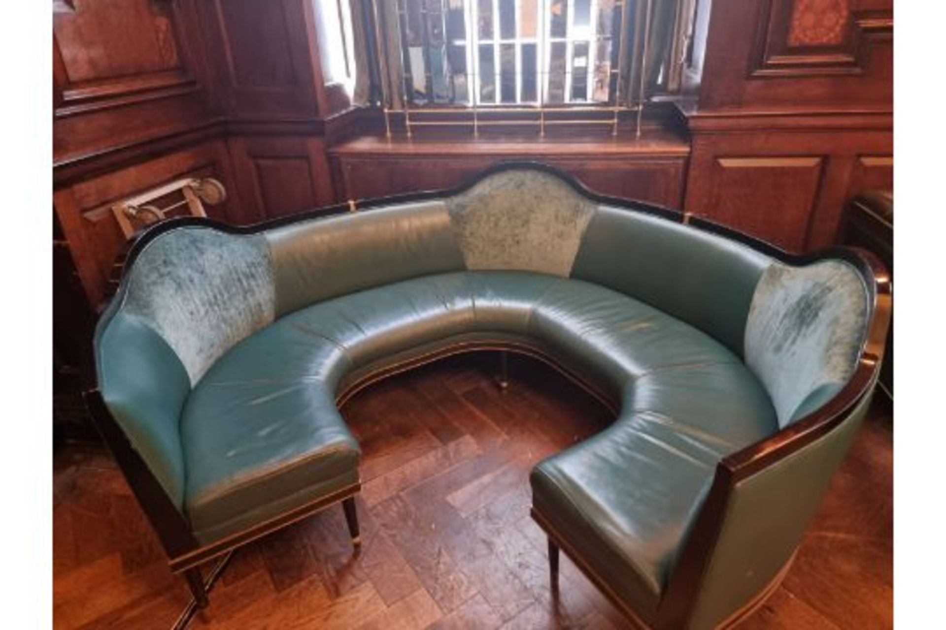 A bespoke Robert Angell tufted leather banquette upholstered  Circular Banquette Bench On Carved - Image 2 of 3