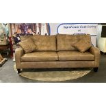 Leather Sofa Stylish And Functional, The Sofa Is Thoughtfully Designed With Tailored Arms And