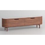The Asher Media Unit combines a solid walnut frame with Italian Carrara marble to produce a