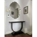 Lullaby Mirror by Opera Contemporary Italy The Lullaby shaped mirror enchants with its elegant