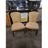 A Pair Of French Side Chairs The Shaped Back And Fixed Deat Pad Resting On Turned Fluted Legs With