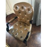 A Leather Tufted Armchair With Chesterfield Style Button And Stud Detail 60 x 63 x 95cm