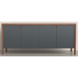 The Carl sideboard has a black American Walnut & Carrara marble effect white ceramic top and