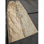 A pair of silk drapes and jabots gold with crystal trim and  embroidered iwith gold silver pattern